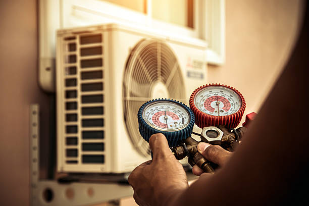 Professional Air Conditioning Service technician working in Sipsey, AL
